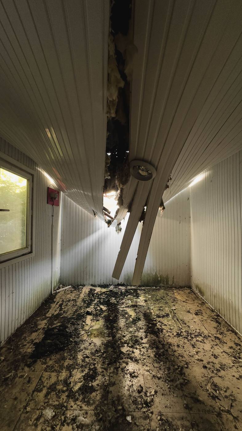 A ceiling collapsed by water from a leak above