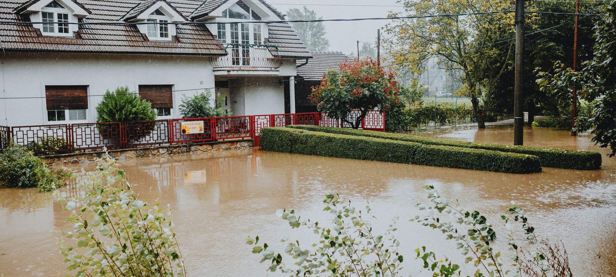 Houses and yards under flood water after a storm